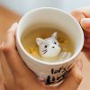 18691487.jpg 萌寵立體小貓咪錘紋咖啡杯碟組